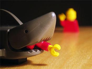 Lego shark with arm in mouth